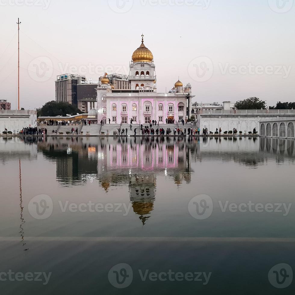 Gurdwara Bangla Sahib is the most prominent Sikh Gurudwara, Bangla Sahib Gurudwara inside view during evening time in New Delhi, India, Sikh Community one of the famous gurudwara Bangla Sahib view photo