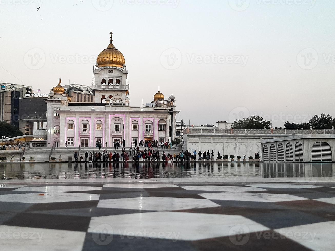 Gurdwara Bangla Sahib is the most prominent Sikh Gurudwara, Bangla Sahib Gurudwara inside view during evening time in New Delhi, India, Sikh Community one of the famous gurudwara Bangla Sahib view photo