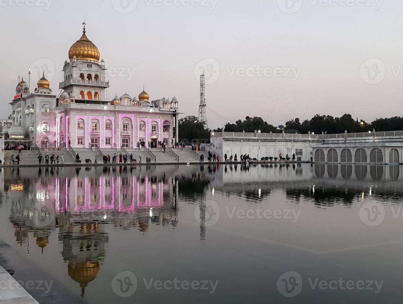 Gurdwara Bangla Sahib is the most prominent Sikh Gurudwara, Bangla Sahib Gurudwara inside view during evening time in New Delhi, India, Sikh Community one of the famous gurudwara Bangla Sahib view photo