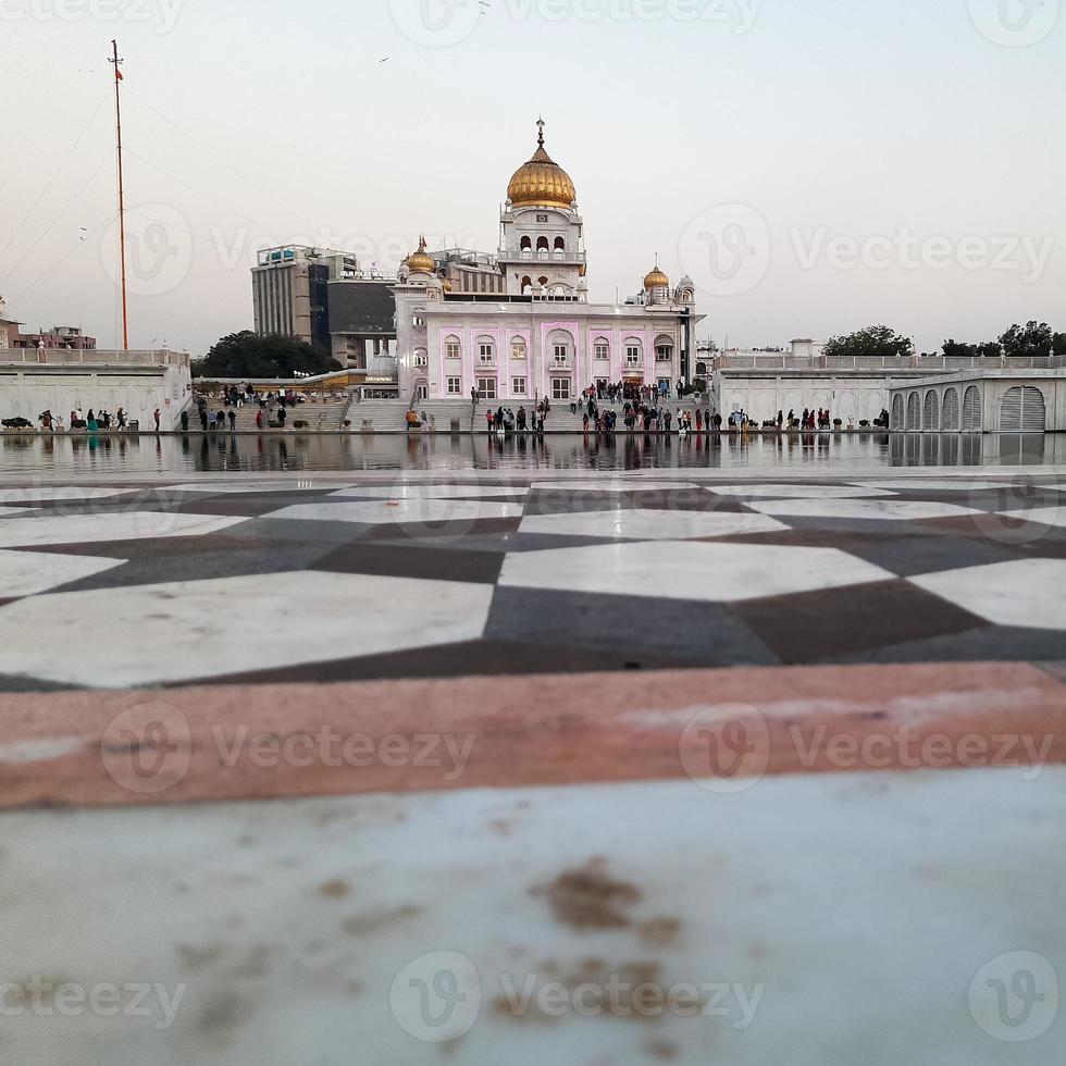 Gurdwara Bangla Sahib is the most prominent Sikh Gurudwara, Bangla Sahib Gurudwara inside view during evening time in New Delhi, India, Sikh Community one of the famous gurudwara Bangla Sahib view photo