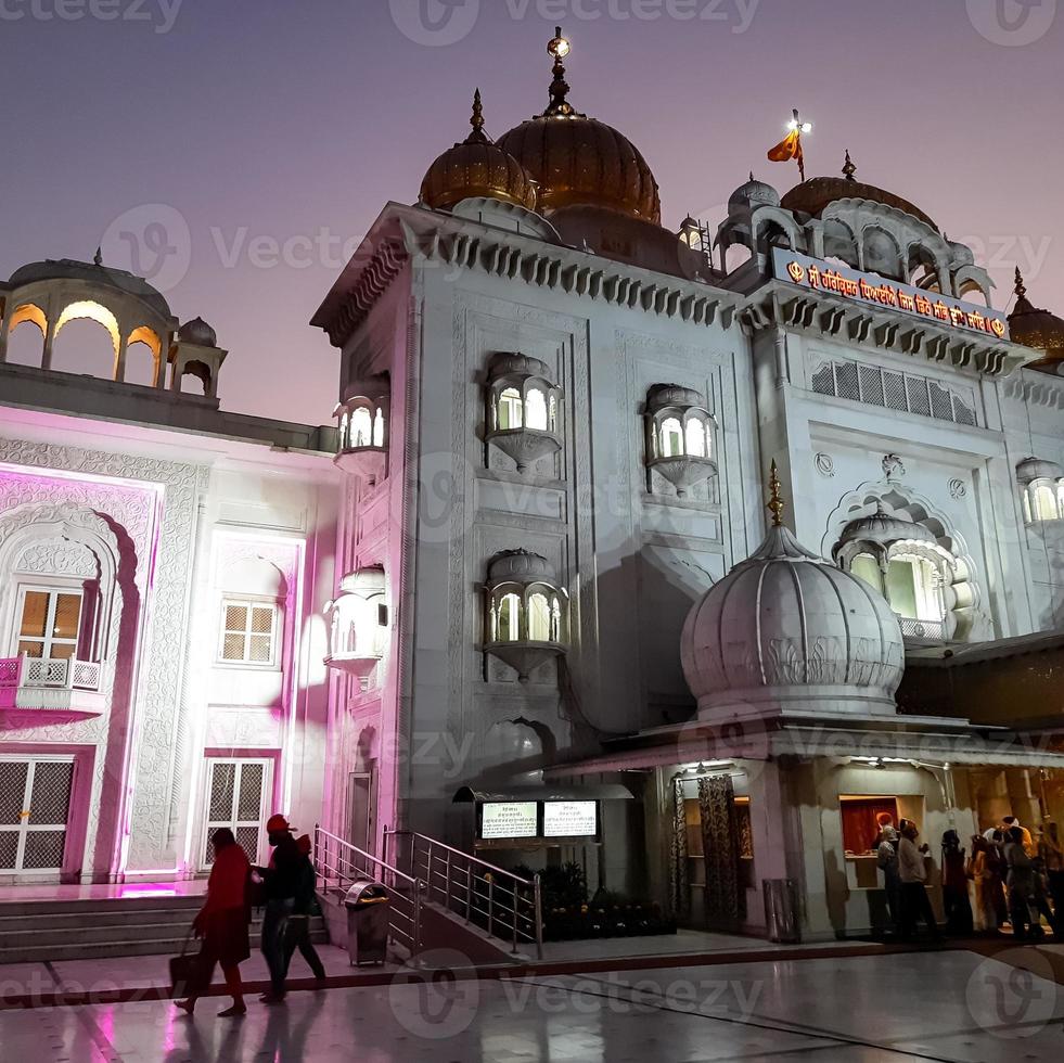 Gurdwara Bangla Sahib is the most prominent Sikh Gurudwara, Bangla Sahib Gurudwara inside view during evening time in New Delhi, India, Sikh Community one of the famous gurudwara Bangla Sahib view photo