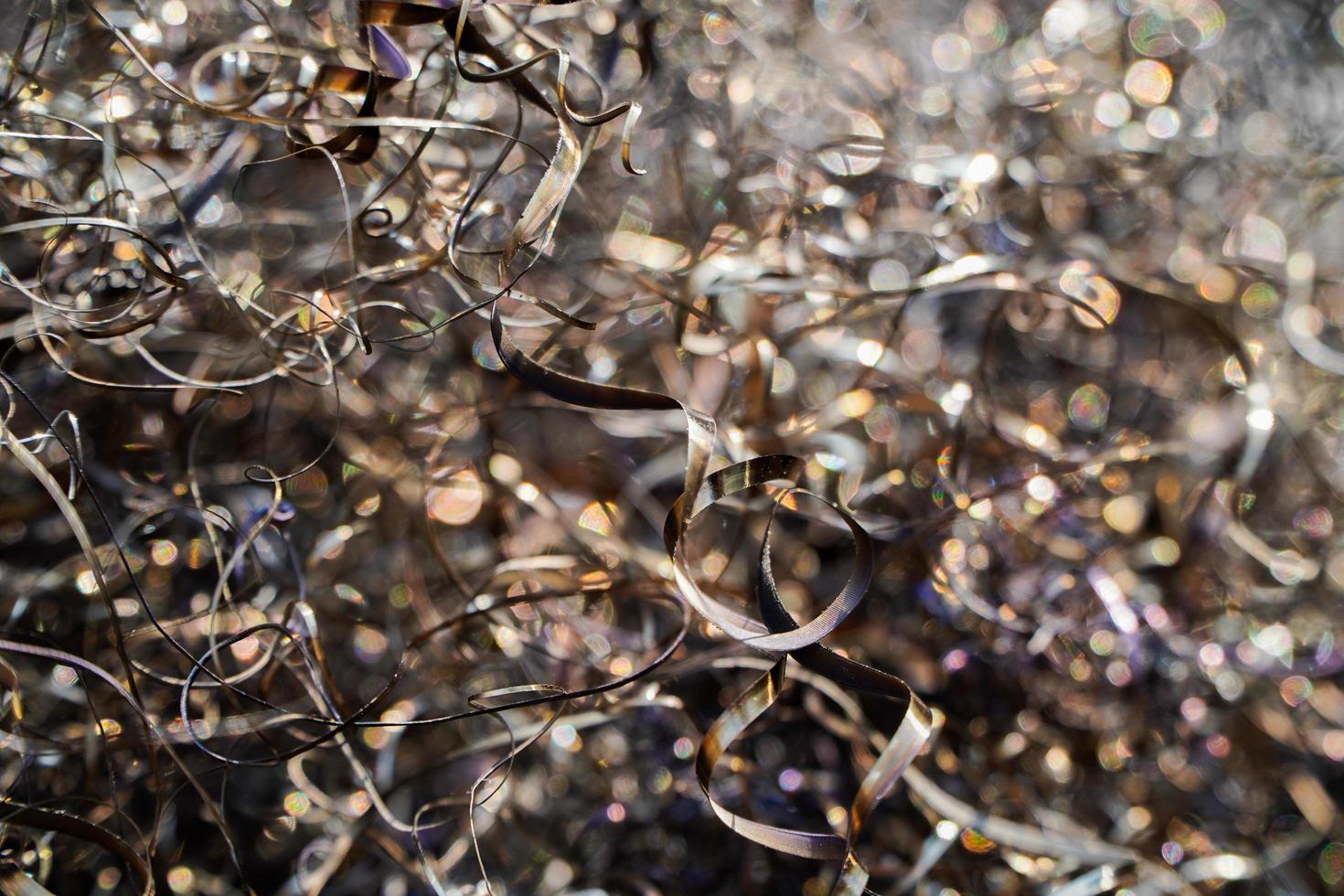 Rusty scrap metal shavings swirls in blue tone.Steel scrap materials recycling. photo