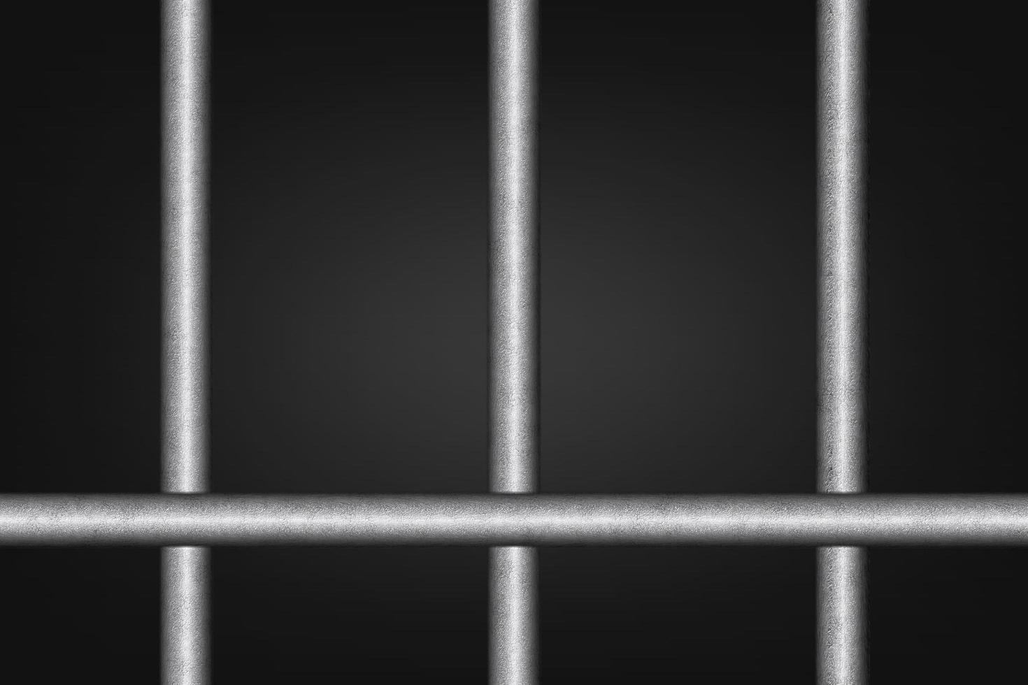 Chrome prison bars on black background photo