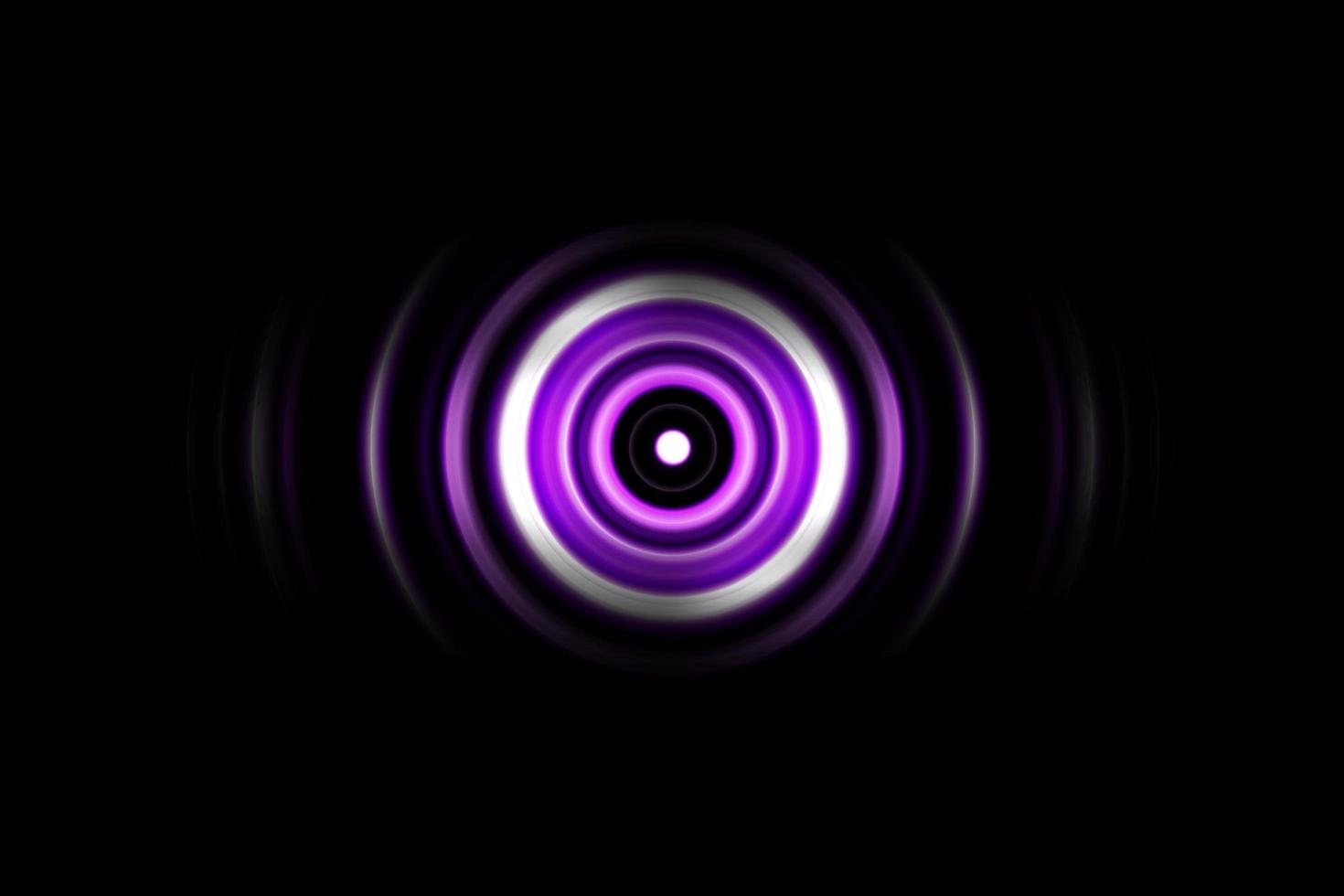 Sound waves oscillating purple light with circle spin abstract background photo