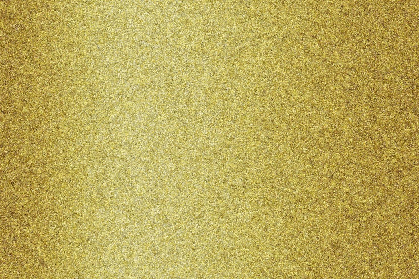 Texture of gold marble or sand washed wall, abstract background photo