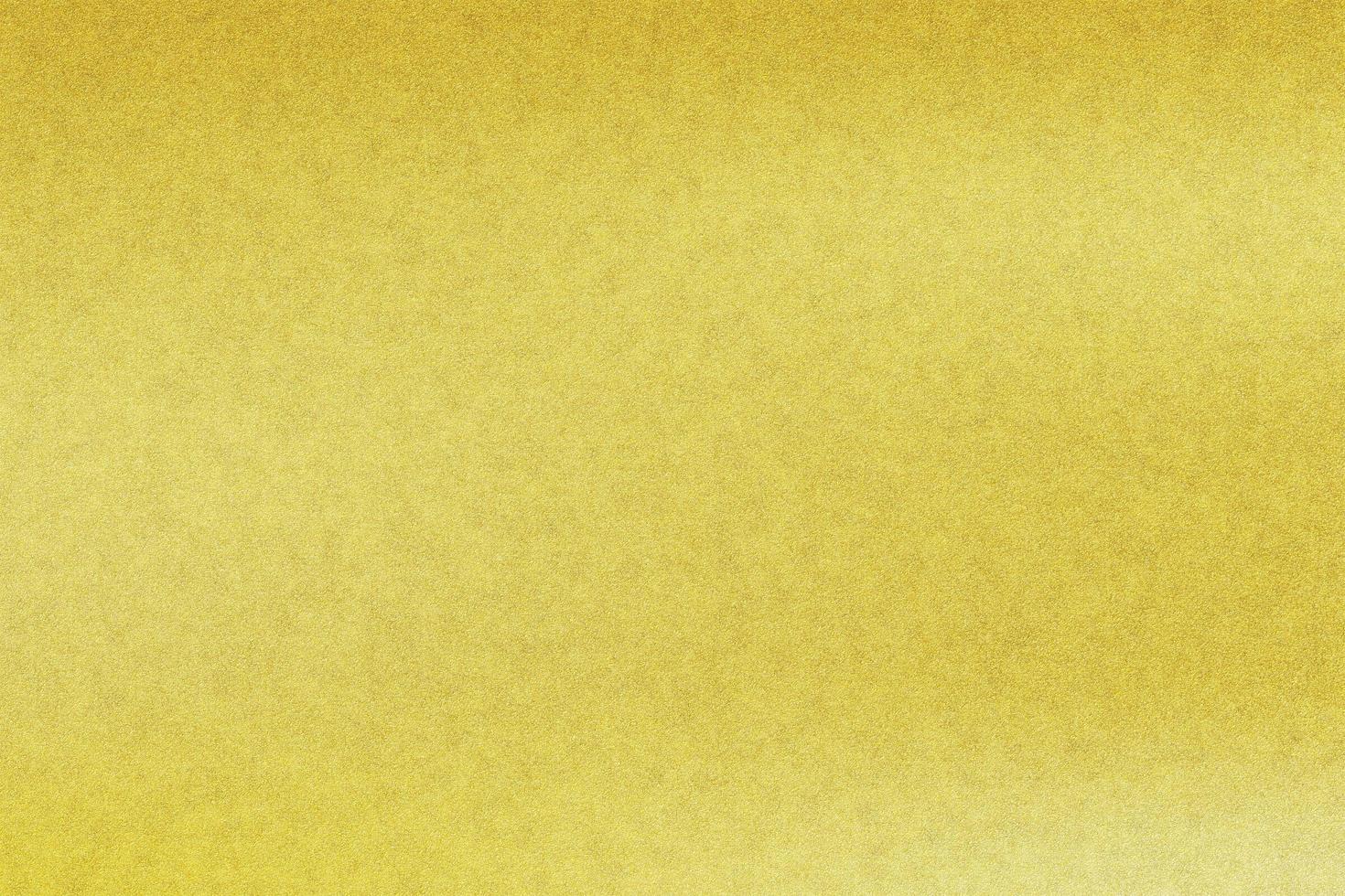 Texture of dirt stains on gold leather, abstract background photo