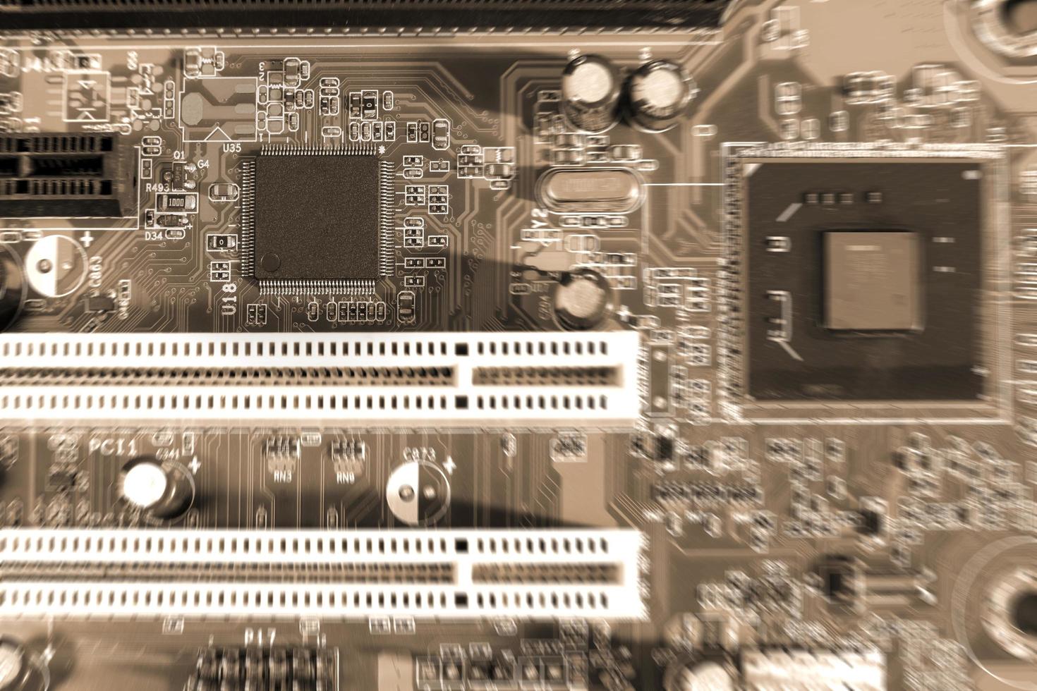 Electronic circuit boards on brown background with chip slot , selective focus photo