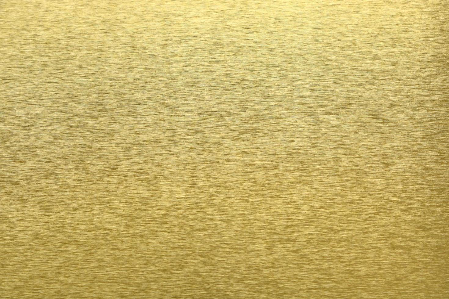Texture of golden metal, abstract pattern background, selective focus photo