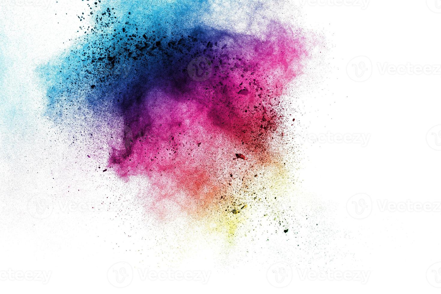 Multicolored powder explosion on white background.Launched colorful particles on background. photo