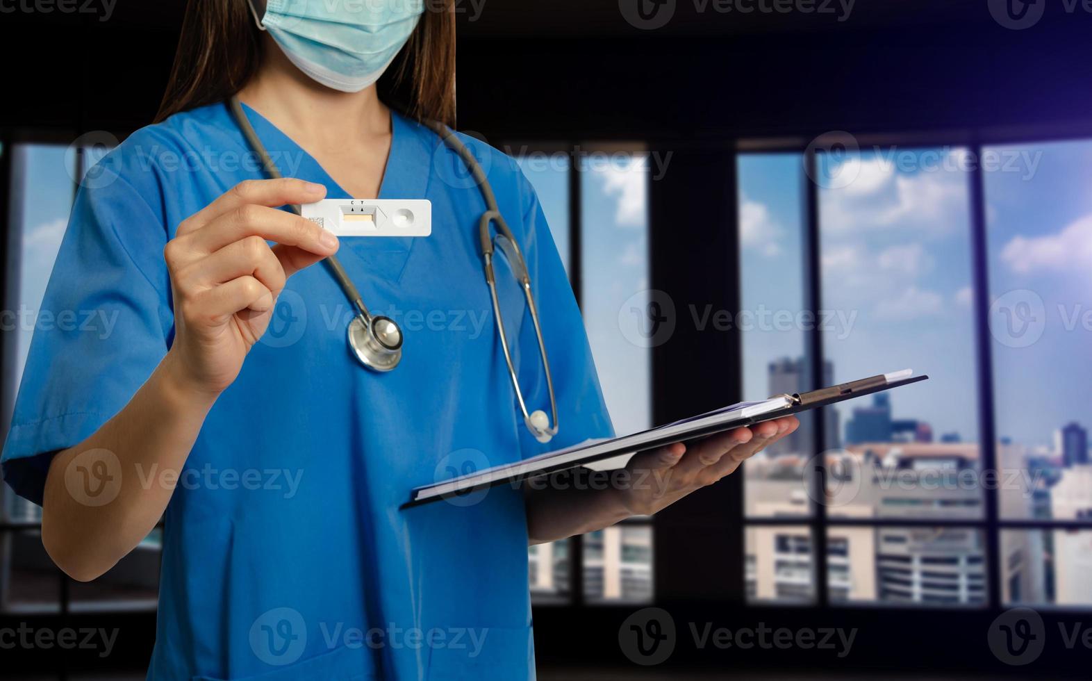 COVID-19 virus disease diagnostic,doctor holding Coronavirus test cassette,rapid strep kit,quick antigen detection testing RADT photo