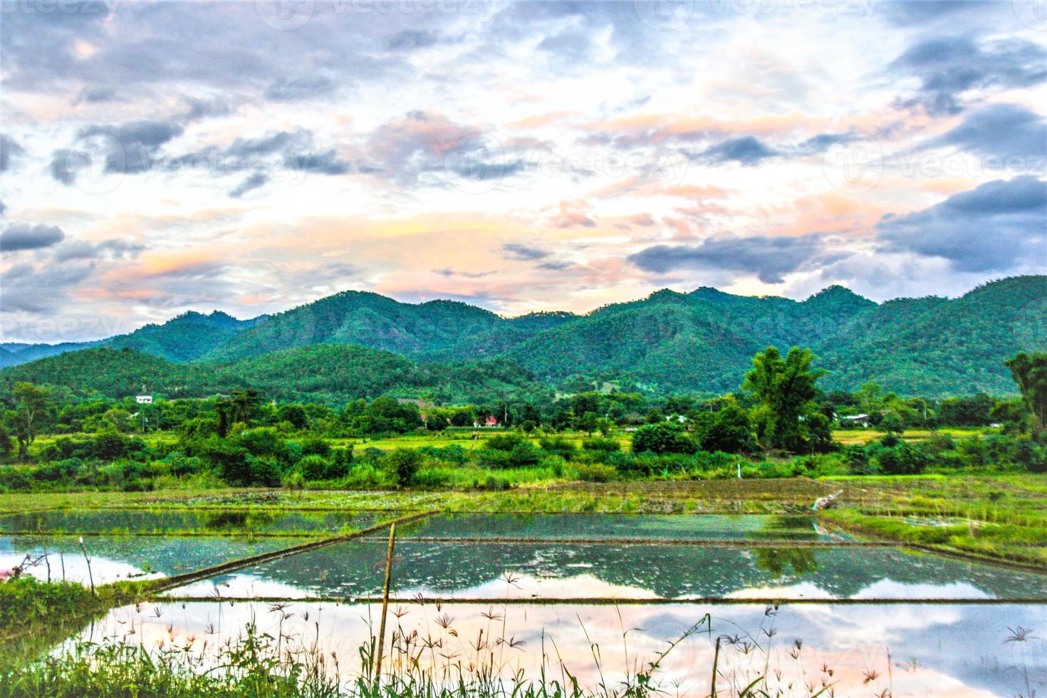 the beauty of fluffy clouds overs the mountain Thai countryside photo