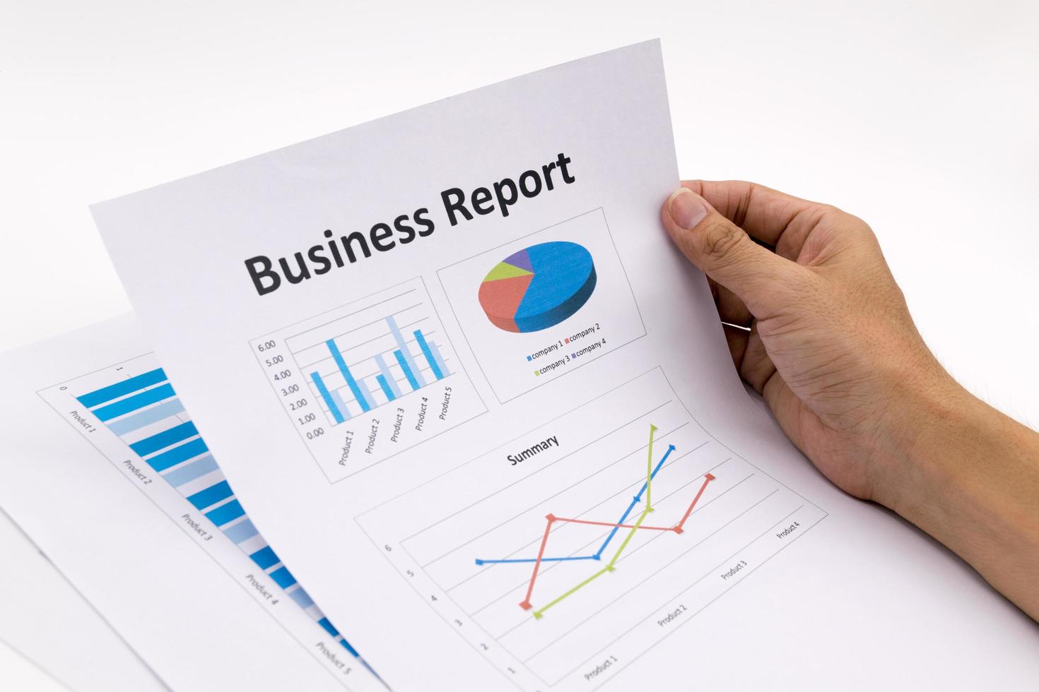 business report and man hand. photo