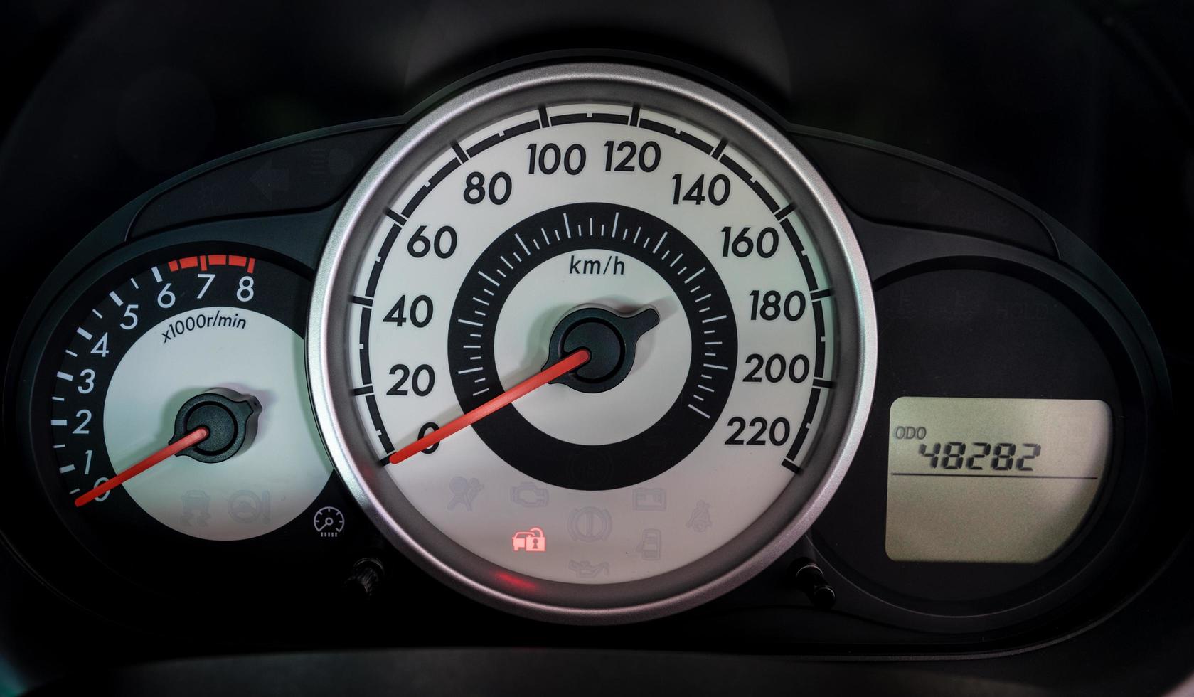 Modern car illuminated dashboard closeup photo