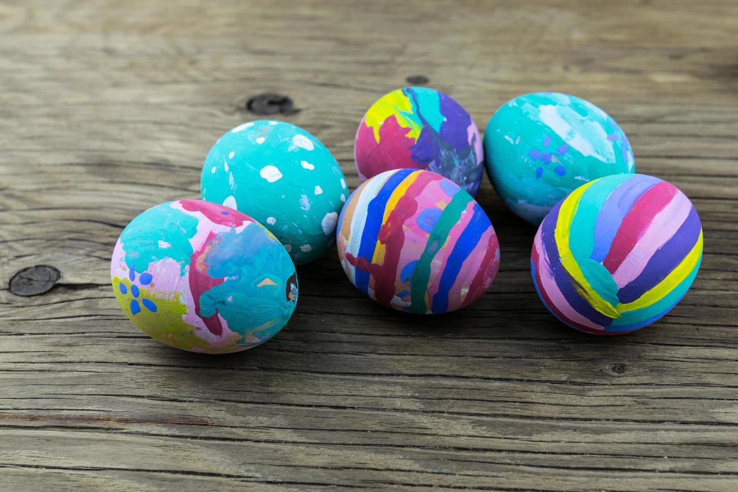 Easter eggs on wooden background. Selective focus. photo