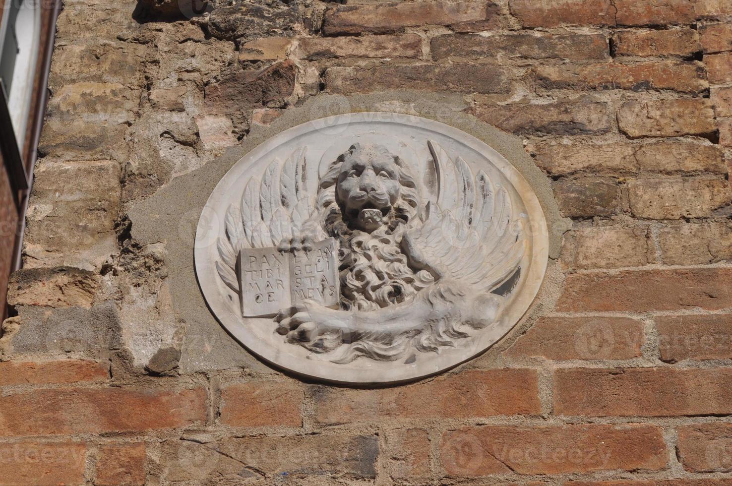 Ancient mask in Venice, Italy photo