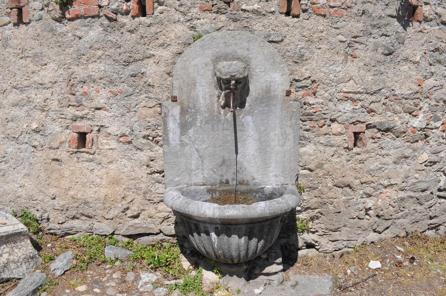 Ancient stone fountain photo