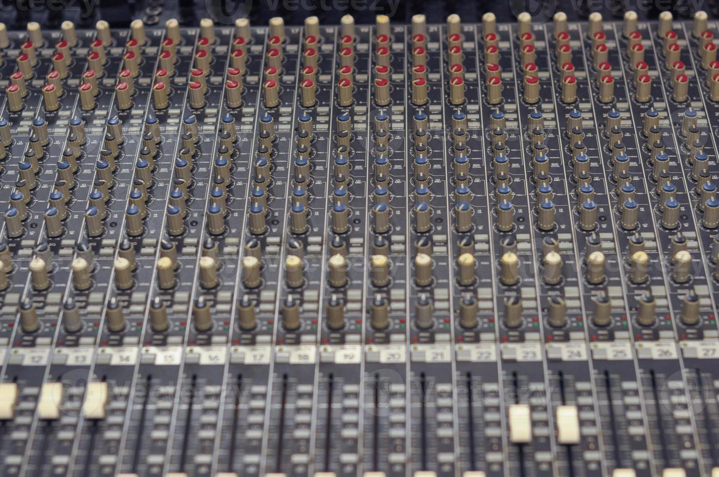 Detail of a soundboard mixer electronic device photo