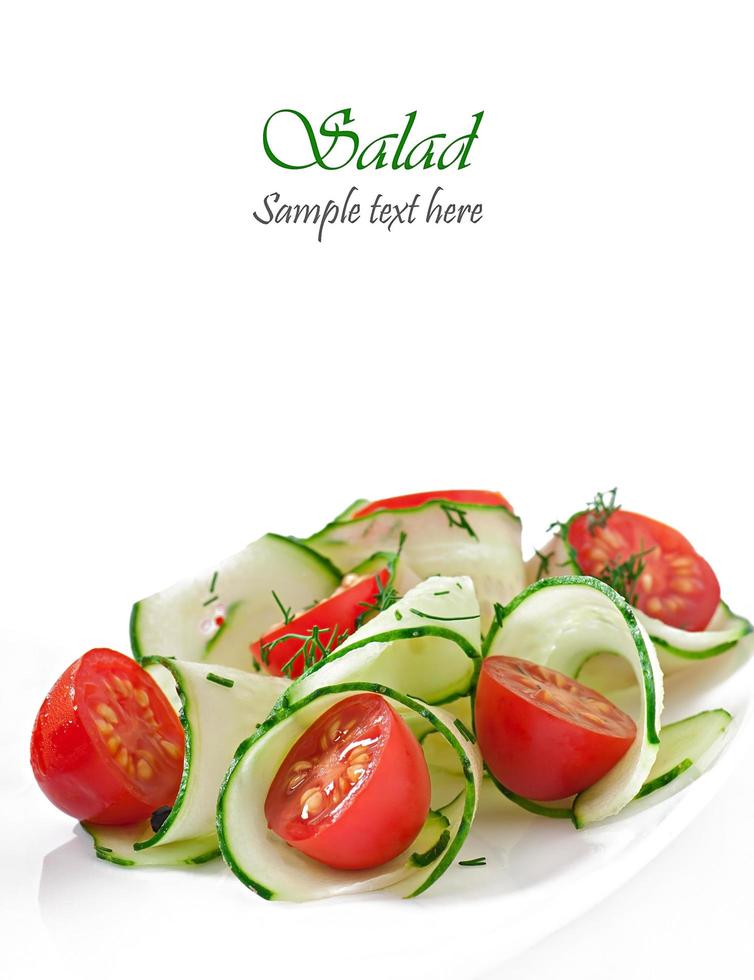 Fresh salad with tomatoes and cucumbers photo