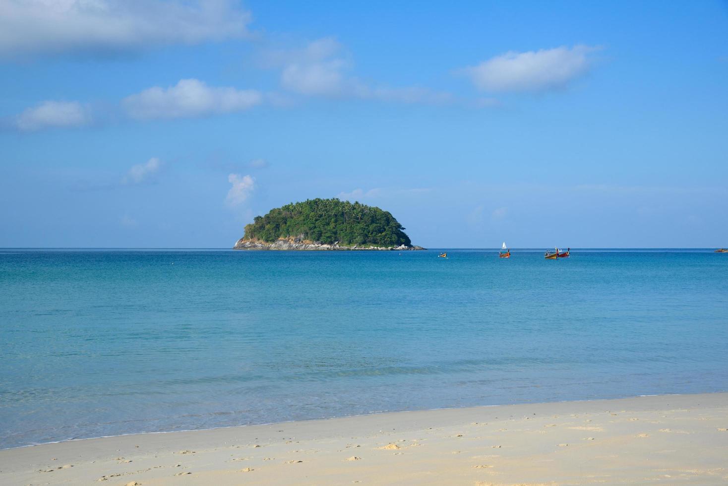 Scene of kata beach and blue sky background photo