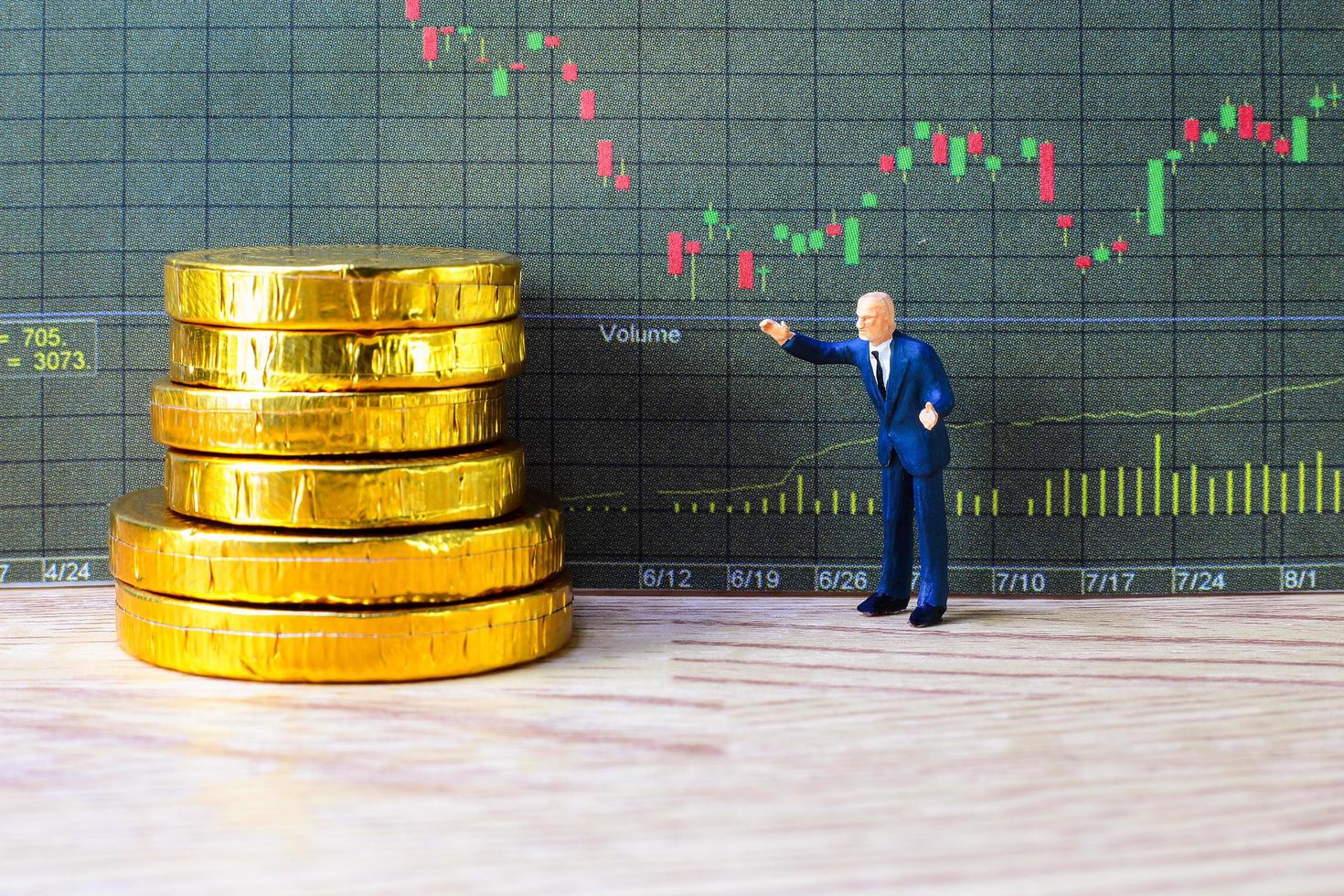 A little trader is taking profit from his stock. trading investment concept. photo