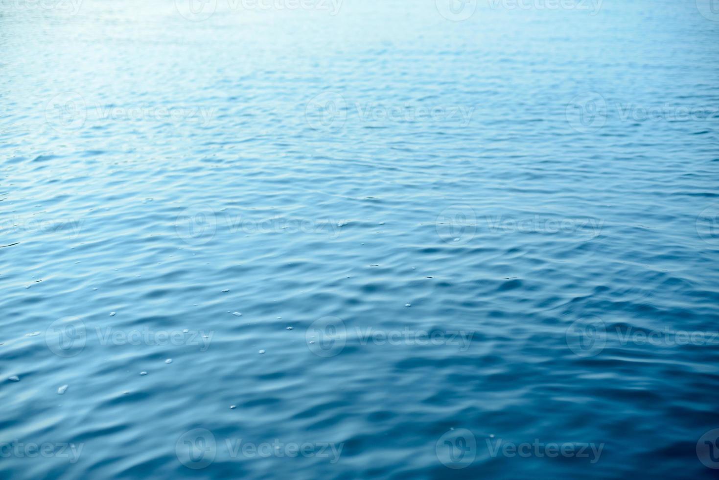 Sea and wave with blue sky at sunset. photo