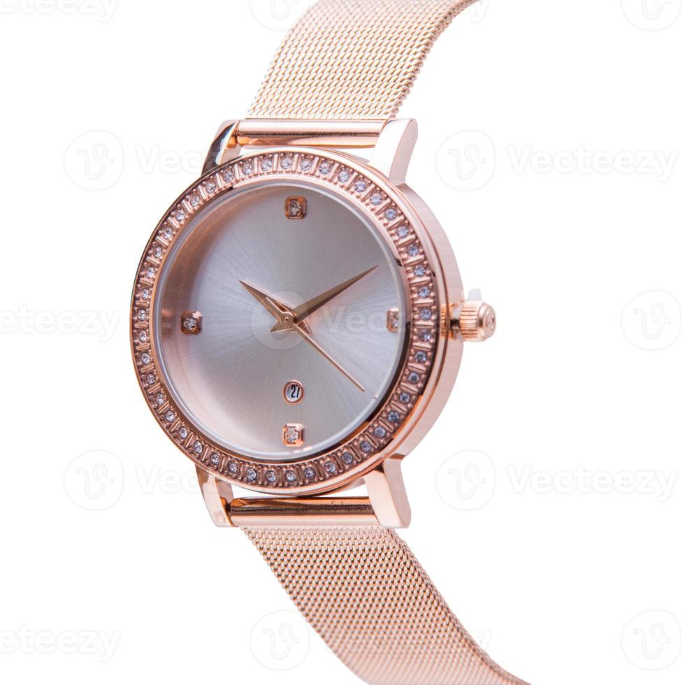 Wrist watch is gold and white color on white background. photo