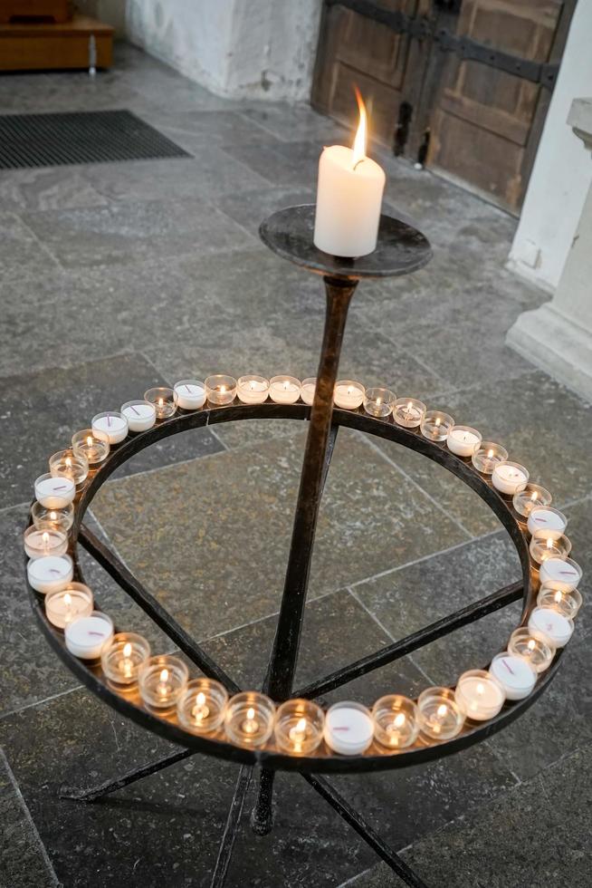 Rothenburg ob der Tauber, Northern Bavaria, Germany, 2014. Candle stand in St James Chuch photo