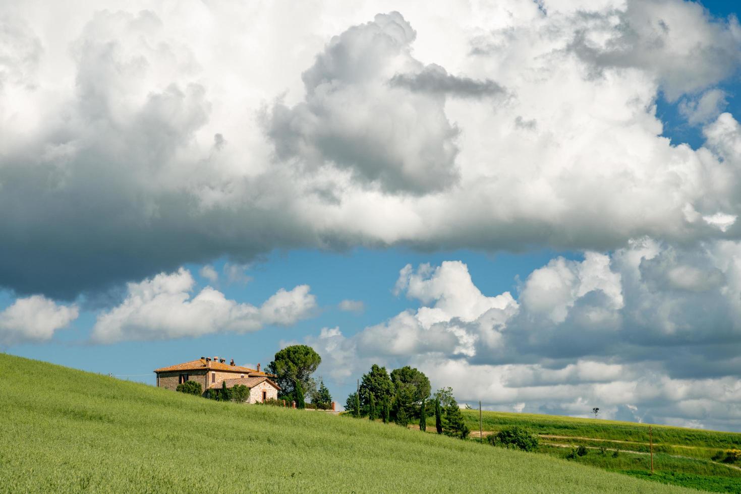 VAL D'ORCIA, TUSCANY, ITALY, 2013. View of a farmhouse in Val d'Orcia photo