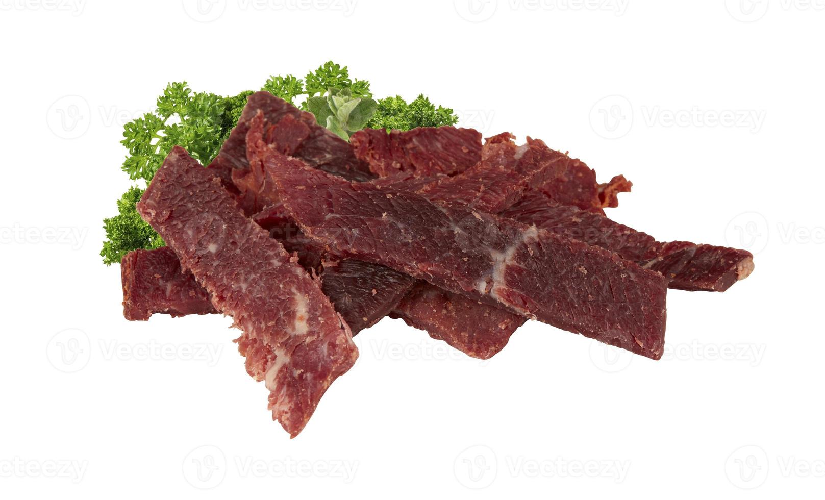 Beef, dried in the sun isolated on white background with cut out photo
