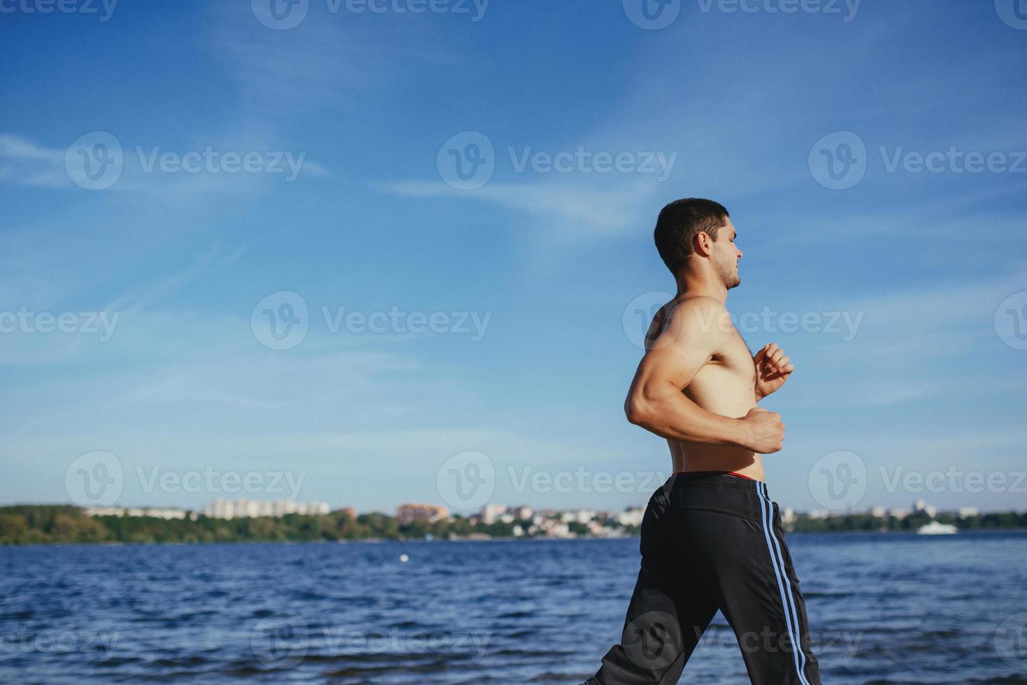 Strong attractive runner photo