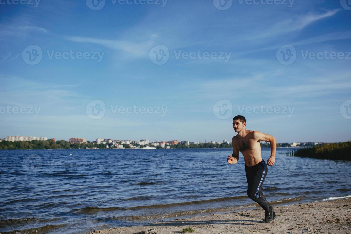 Strong attractive runner photo