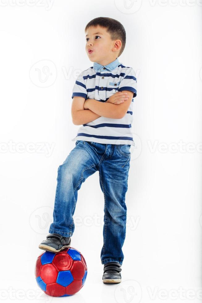 little boy footballer isolated photo