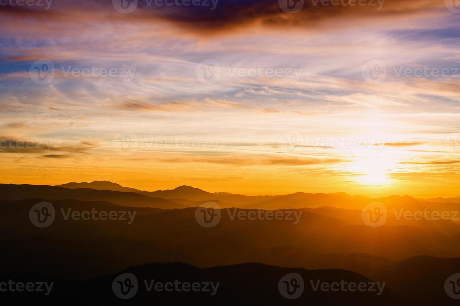 blue color of mountains during sunset photo