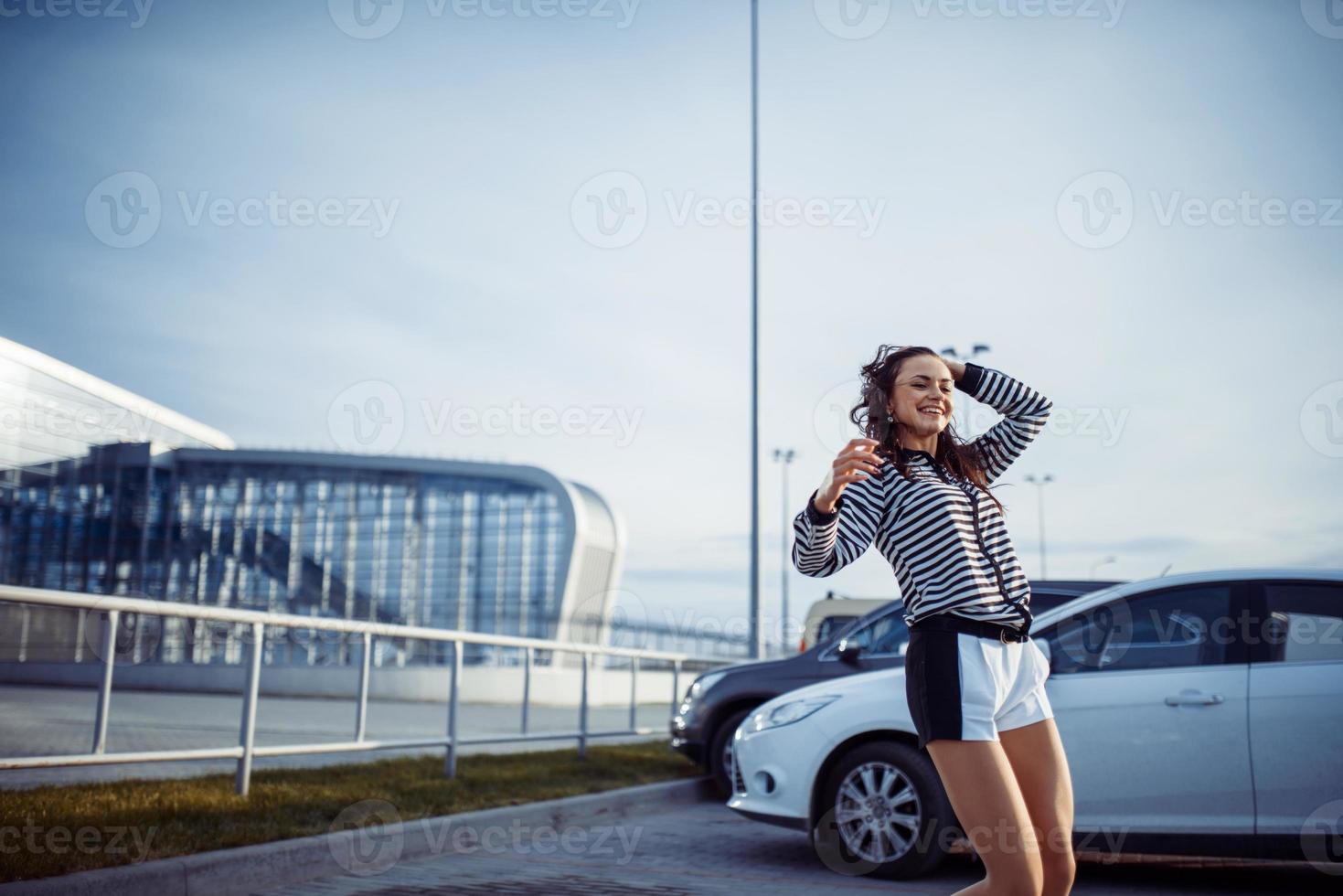 young carefree woman jumping photo