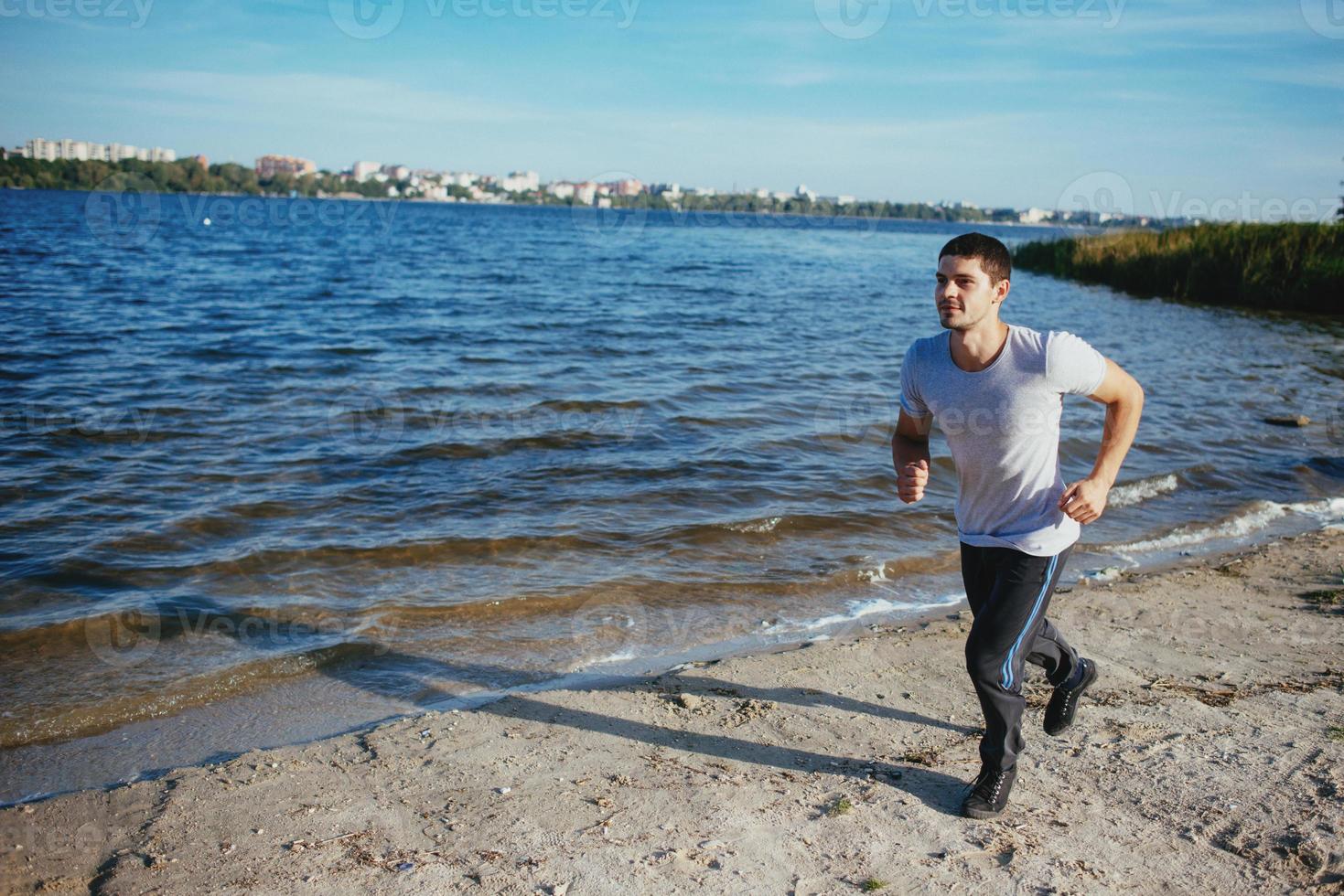 Strong attractive runner photo