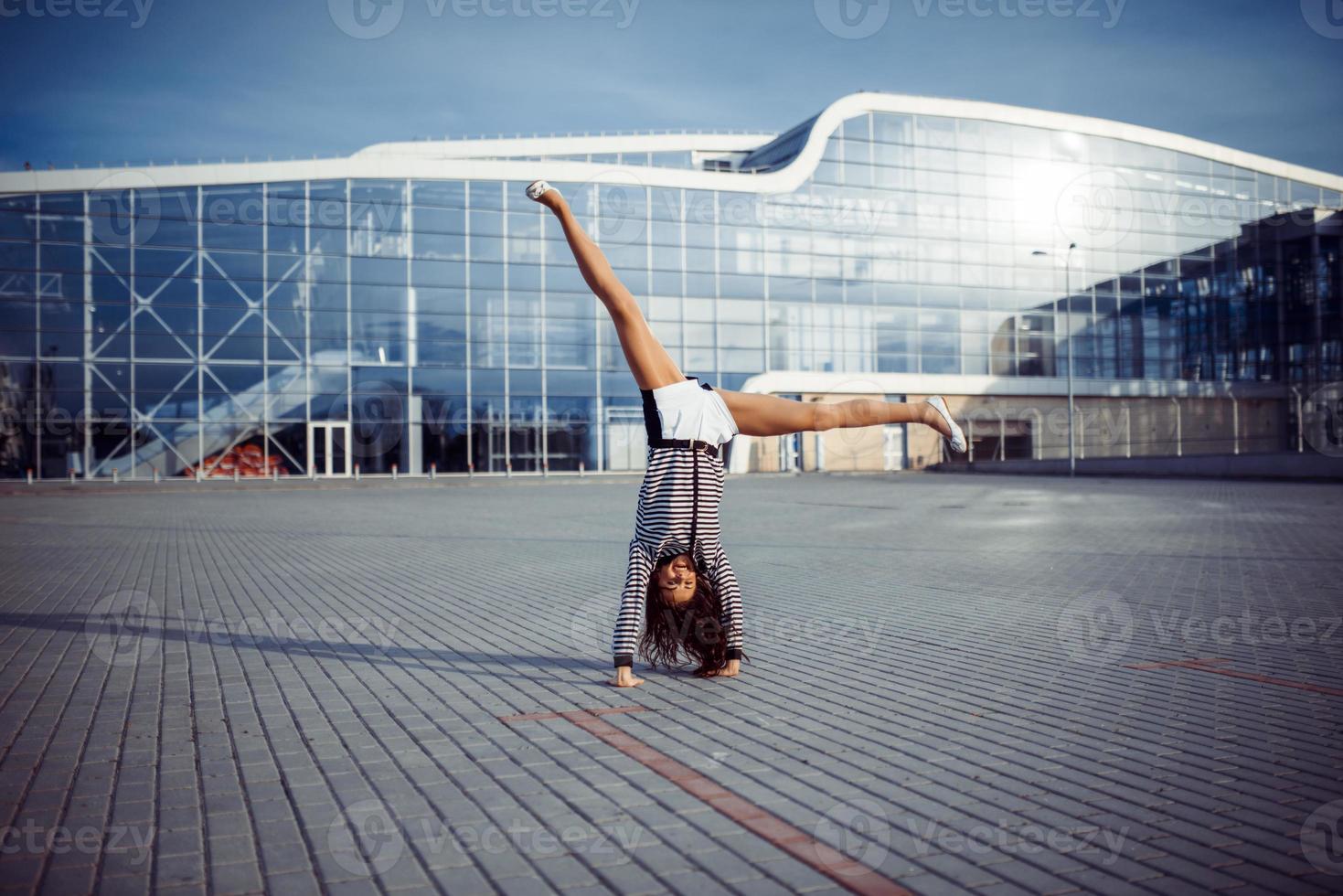 young carefree woman jumping photo