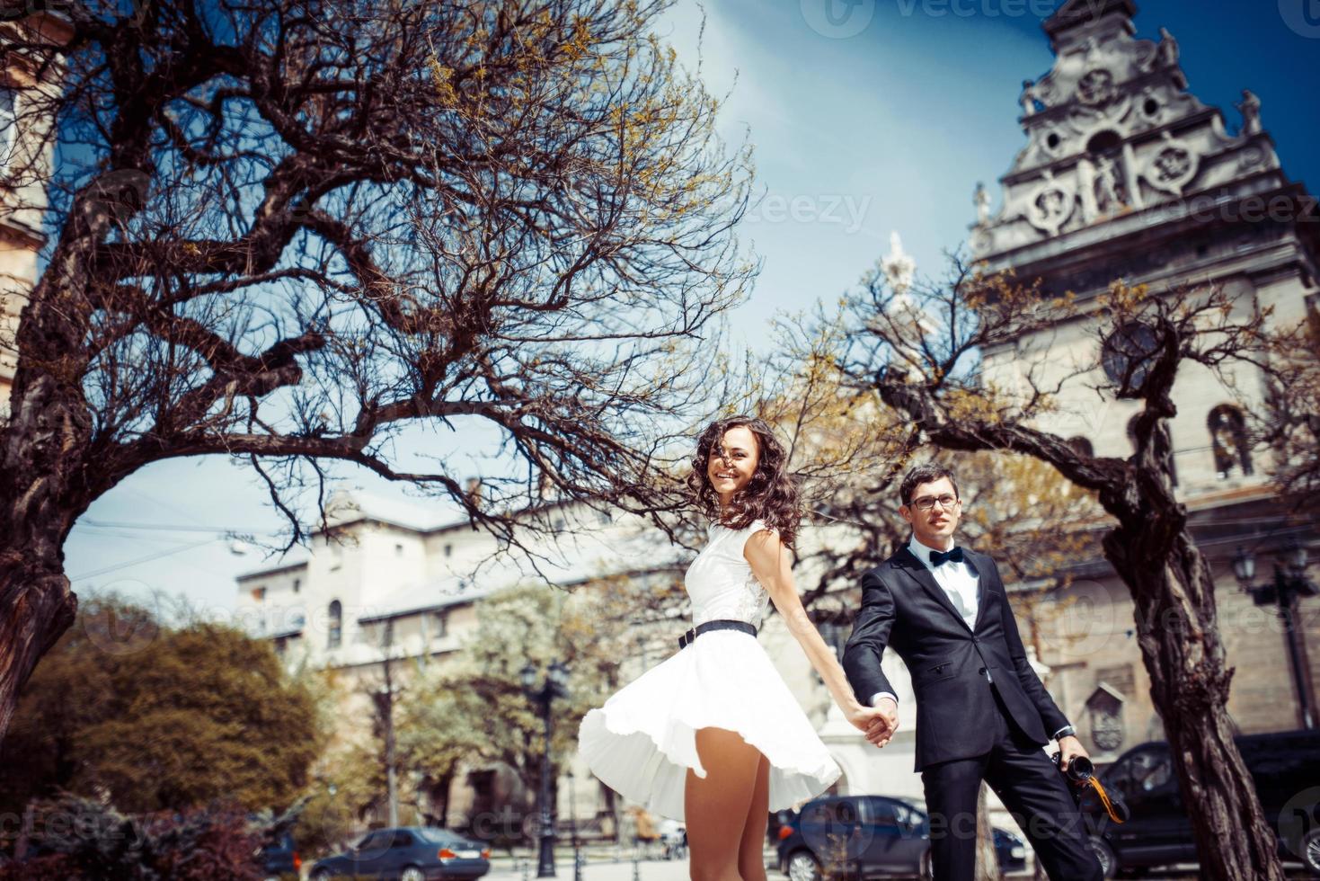 happy and loving couple walking and make photo in the old city