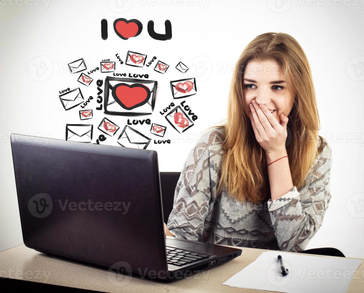 Young pretty business woman with notebook photo