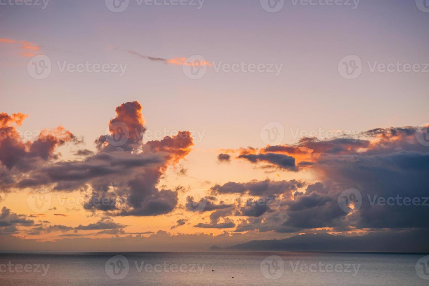 sunset over the water photo