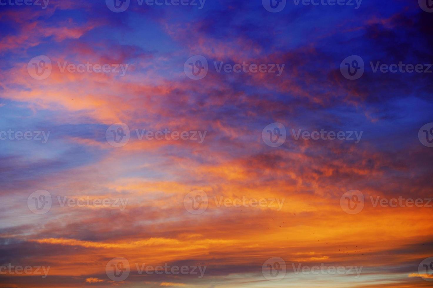 colorful sky with sun background in mountains photo