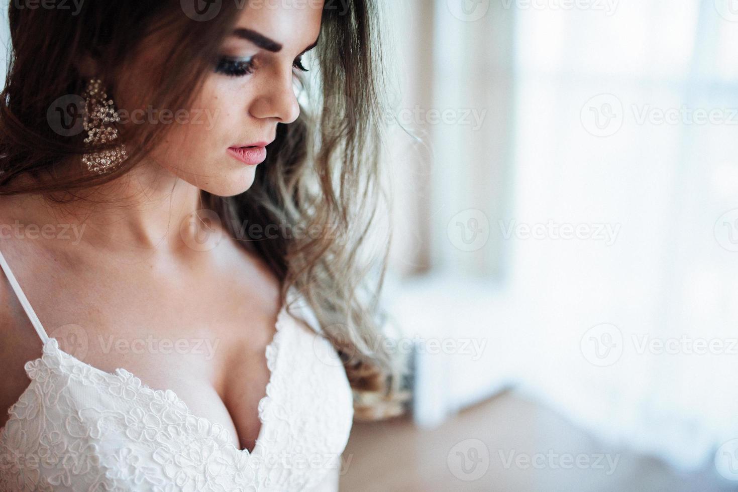 Wedding couple in hotel room photo