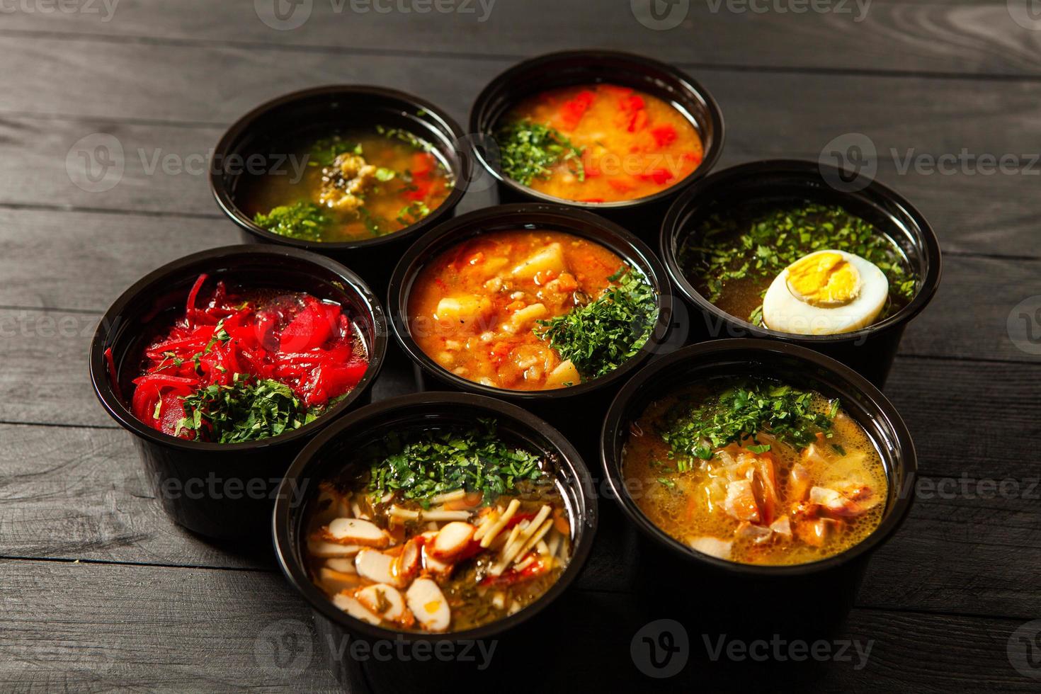 Business lunch in eco plastic container ready for delivery.Top view. Office Lunch boxes with food ready to go. Food takes away. Catering, brakfast. photo