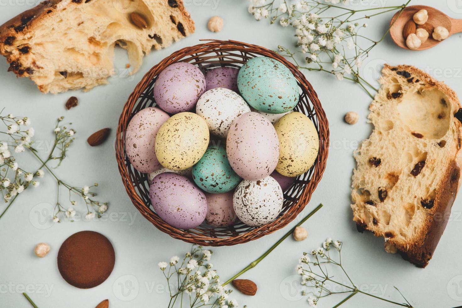 Hand painted pastel colored Easter eggs background. Happy Easter greeting card or invitation. photo