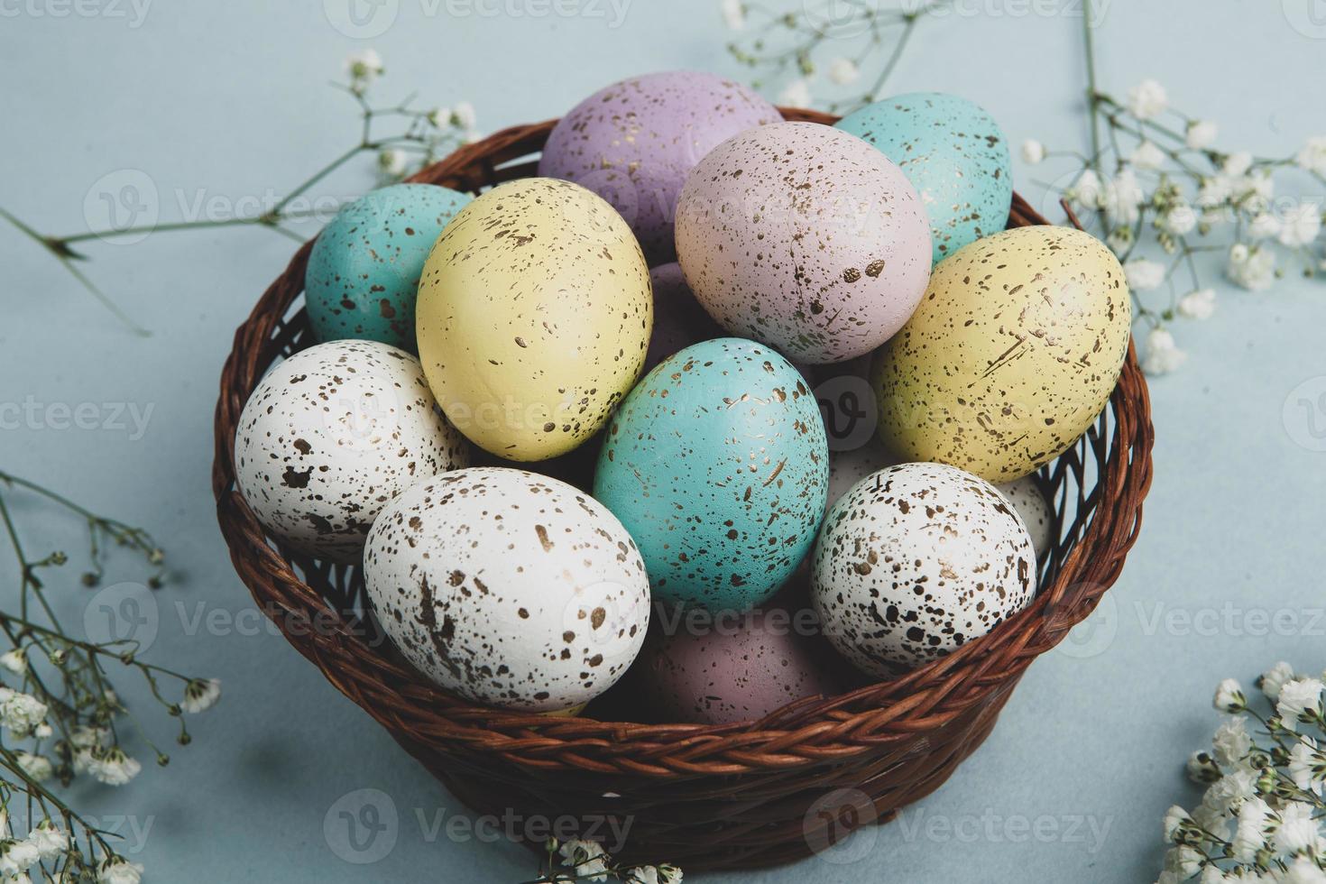 Hand painted pastel colored Easter eggs background. Happy Easter greeting card or invitation. photo