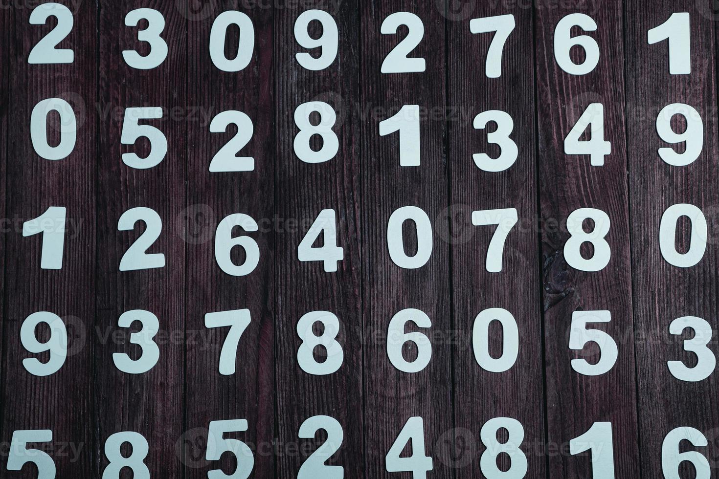 Background of numbers. from zero to nine. Numbers texture. Finance data concept. Mathematic. Seamless pattern with numbers. financial crisis concept. Business success. photo