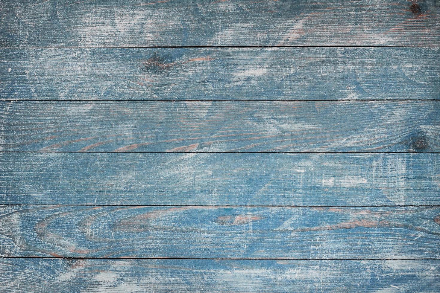 Vintage blue wood background texture with knots and nail holes. Old painted wood wall. Blue abstract background. Vintage wooden dark blue horizontal boards. photo