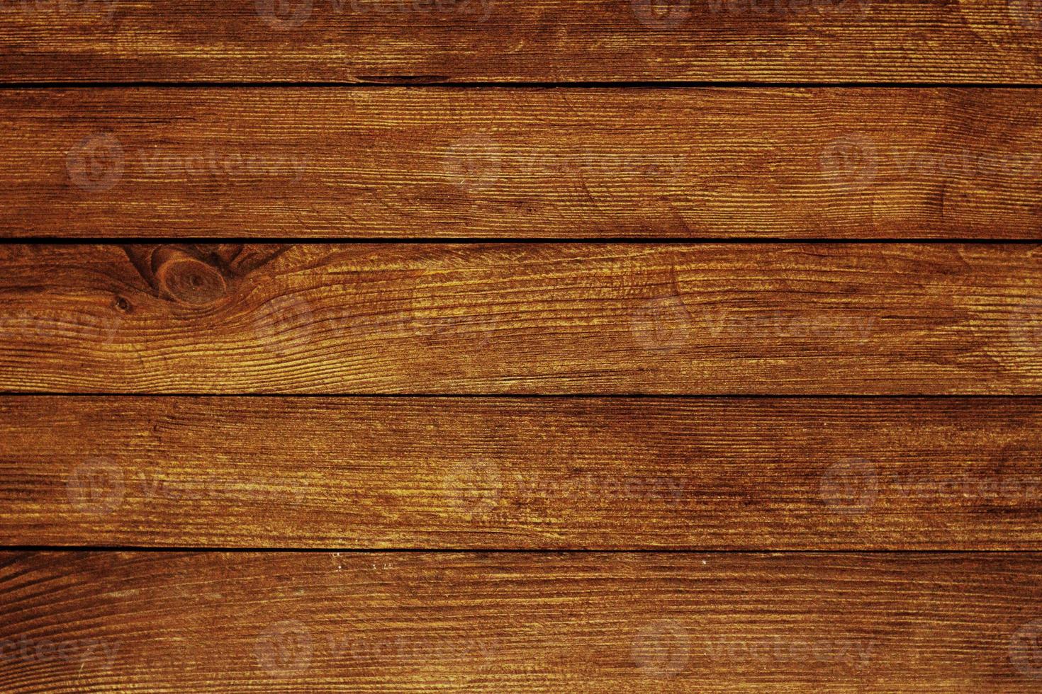 Vintage brown wood background texture with knots and nail holes. Old painted wood wall. Brown abstract background. Vintage wooden dark horizontal boards. Front view with copy space photo