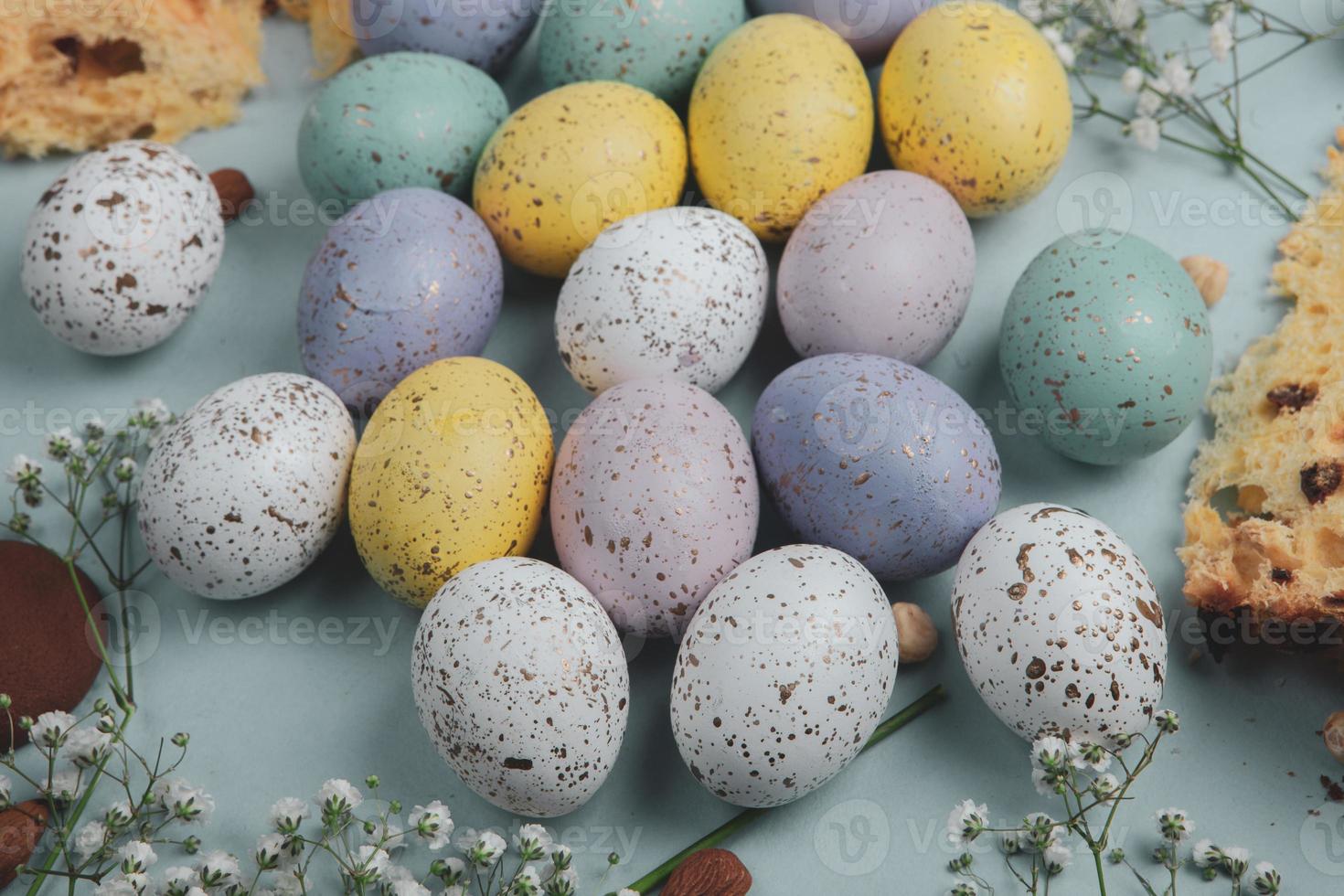Hand painted pastel colored Easter eggs background. Happy Easter greeting card or invitation. photo