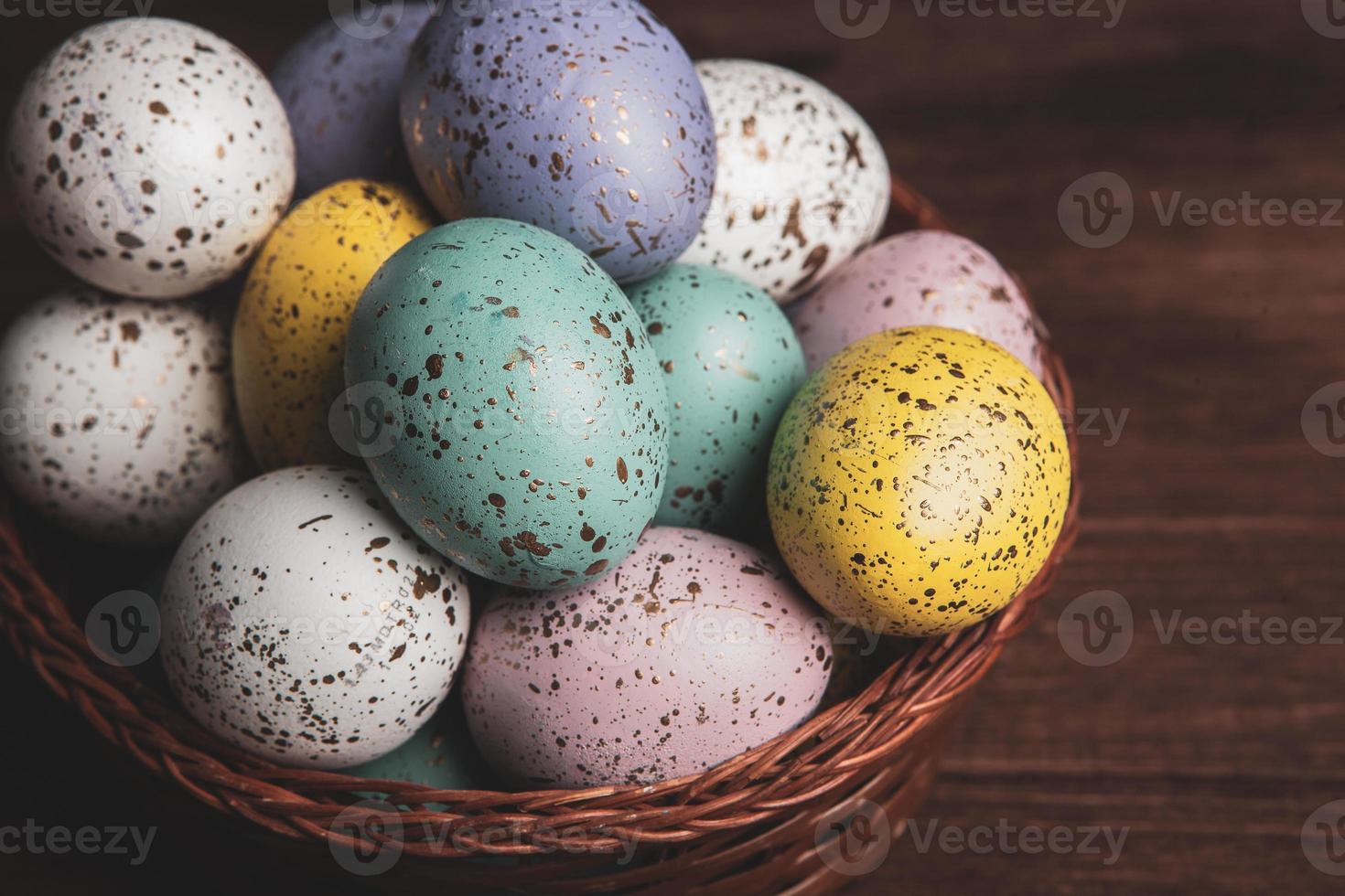 Hand painted pastel colored Easter eggs background. Happy Easter greeting card or invitation. photo