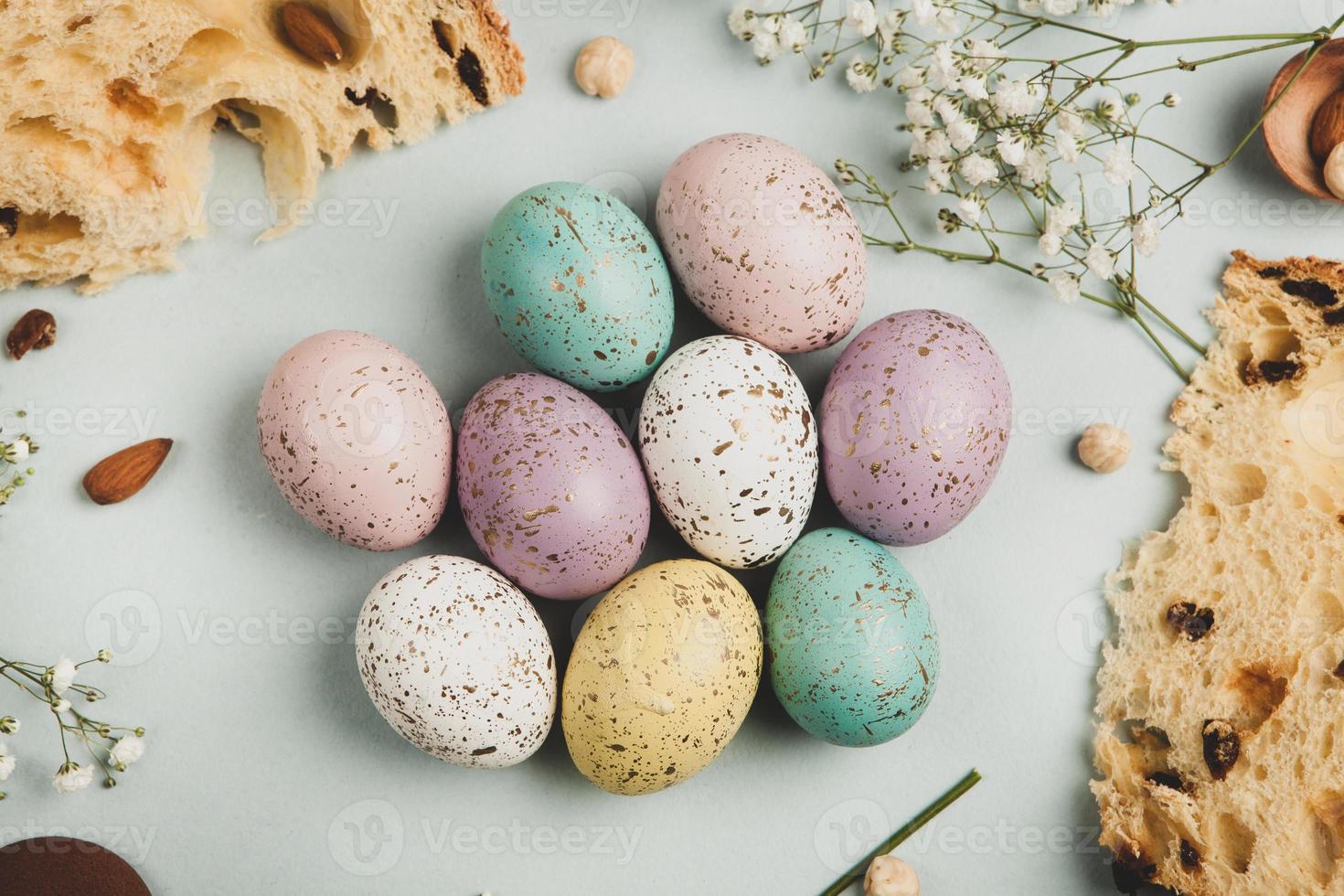 Hand painted pastel colored Easter eggs background. Happy Easter greeting card or invitation. photo